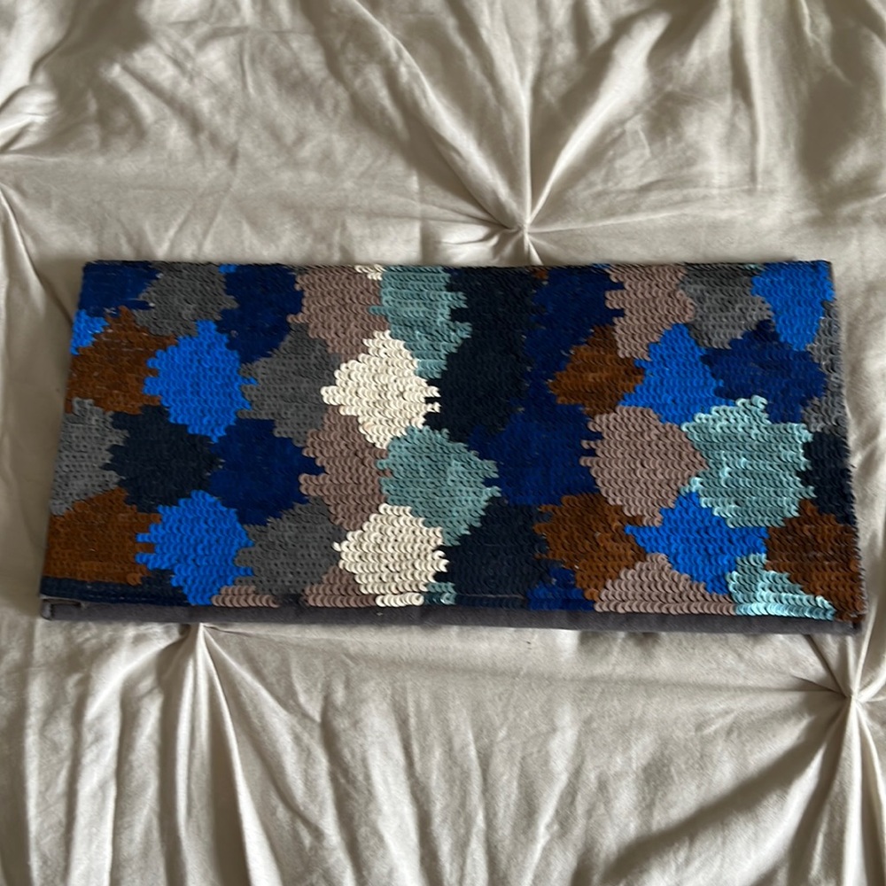 Clutch bag, multi color sequins with gray linen back and inside.